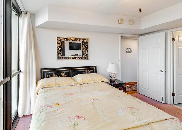 Bright & Convenient With Pool Balcony & Angled Ocean Views